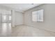 Bright living area featuring tile floors and natural light at 4078 Blue Manor Ln, North Las Vegas, NV 89032