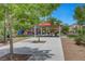 Community recreation area with playground, picnic shelter, and mature trees for a Gathering-friendly atmosphere at 4078 Blue Manor Ln, North Las Vegas, NV 89032