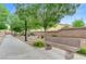 Community walking path near seating areas and landscaping, perfect for a relaxing stroll at 4078 Blue Manor Ln, North Las Vegas, NV 89032