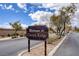 Street view of the Davyn Ridge community entrance sign surrounded by lush greenery and landscaping at 4078 Blue Manor Ln, North Las Vegas, NV 89032