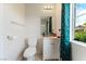 Bathroom featuring vanity, mirror, toilet, towel rack, and shower at 4329 Skimmers Ct, North Las Vegas, NV 89084