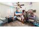 Whimsical bedroom featuring bunk beds, a desk, and jellyfish decorations at 4329 Skimmers Ct, North Las Vegas, NV 89084