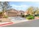 Charming single-story home with a well-manicured lawn and inviting curb appeal at 4329 Skimmers Ct, North Las Vegas, NV 89084
