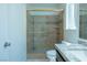 Updated bathroom features glass-door shower and a modern vanity at 4481 Faberge Ave, Las Vegas, NV 89115
