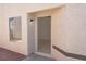 Exterior front entryway featuring a textured wall finish at 4481 Faberge Ave, Las Vegas, NV 89115