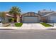 Charming single-story home with a well-manicured yard and driveway at 4481 Faberge Ave, Las Vegas, NV 89115