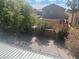 The cozy backyard featuring decorative plants and a gravel ground at 4951 Ivylyn Ct, Las Vegas, NV 89122