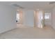 A view of the hallway featuring the laundry room and adjacent rooms at 528 Sunny Pointe St, Henderson, NV 89011