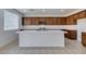 Spacious kitchen island, stainless appliances, and ample storage, perfect for cooking and entertaining at 528 Sunny Pointe St, Henderson, NV 89011