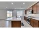 Modern kitchen with a spacious island, stainless steel appliances, and plenty of counter space at 528 Sunny Pointe St, Henderson, NV 89011