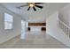 View of the open-concept living space, which flows seamlessly from the living room to the kitchen at 528 Sunny Pointe St, Henderson, NV 89011