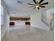 An expansive open-concept floorplan connects the living area to a modern kitchen at 528 Sunny Pointe St, Henderson, NV 89011