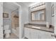 Neat bathroom with neutral finishes and a shower-tub combination at 5433 Escallonia St, Las Vegas, NV 89149