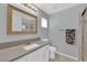 Well-lit bathroom featuring a glass-enclosed shower, bright vanity, and modern fixtures at 5433 Escallonia St, Las Vegas, NV 89149
