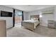 Comfortable bedroom with carpet, sliding glass door to the backyard, and neutral decor at 5433 Escallonia St, Las Vegas, NV 89149