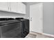 Functional laundry room with modern washer and dryer units at 5433 Escallonia St, Las Vegas, NV 89149