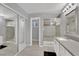 Modern bathroom with glass-enclosed shower and a large vanity at 5433 Escallonia St, Las Vegas, NV 89149