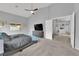 Spacious main bedroom featuring high ceilings, neutral colors, and a ceiling fan at 5433 Escallonia St, Las Vegas, NV 89149