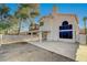 Expansive backyard featuring a covered patio and ample space for creating your dream outdoor oasis at 5466 Silverheart Ave, Las Vegas, NV 89142