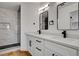 Modern bathroom featuring double vanities, sleek fixtures, and a stylish shower, designed for everyday luxury at 5466 Silverheart Ave, Las Vegas, NV 89142