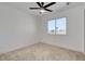 Bright bedroom with a large window offering ample natural light and neutral carpeting at 5466 Silverheart Ave, Las Vegas, NV 89142