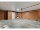 Spacious garage with concrete floors and ample room for parking and storage at 5466 Silverheart Ave, Las Vegas, NV 89142