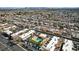 Extensive aerial view of a neighborhood, showcasing the apartment complex with a pool in the foreground at 5939 Vegas Dr, Las Vegas, NV 89108