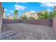Backyard with landscaped perimeter ready for relaxation and entertaining at 6142 Kelson Creek Ct, Las Vegas, NV 89118