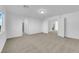 Bright bedroom with neutral carpet and view of ensuite bath at 6142 Kelson Creek Ct, Las Vegas, NV 89118