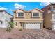 Charming two-story home with a well-manicured front yard and a spacious two-car garage at 6142 Kelson Creek Ct, Las Vegas, NV 89118