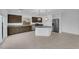 Open kitchen area with tile floors, stainless appliances and plenty of cabinet space at 6142 Kelson Creek Ct, Las Vegas, NV 89118
