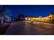 Backyard area featuring sport court with lighting and well maintained landscaping at 6419 Eldora Ave, Las Vegas, NV 89146
