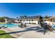 Spacious backyard boasts a pool, patio seating, and a solar panel system installed on the roof at 6419 Eldora Ave, Las Vegas, NV 89146