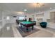 Spacious game room with billiard table, bar, and ample seating at 6419 Eldora Ave, Las Vegas, NV 89146
