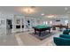 Spacious game room with billiard table, bar, and ample seating at 6419 Eldora Ave, Las Vegas, NV 89146