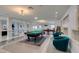 Spacious game room with billiard table, bar, and ample seating at 6419 Eldora Ave, Las Vegas, NV 89146