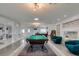 Spacious game room with billiard table, bar, and ample seating at 6419 Eldora Ave, Las Vegas, NV 89146