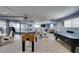 Spacious garage transformed into a game room featuring a foosball table and an air hockey table at 6419 Eldora Ave, Las Vegas, NV 89146