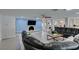 Bright living room featuring a modern fireplace, recessed lights, fan, and oversized leather sofa at 6419 Eldora Ave, Las Vegas, NV 89146