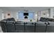Open living room featuring a fireplace, recessed lights, modern ceiling fan, and oversized sofa at 6419 Eldora Ave, Las Vegas, NV 89146