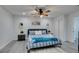 Calm main bedroom featuring a ceiling fan, soft decor, and plenty of space to relax at 6419 Eldora Ave, Las Vegas, NV 89146