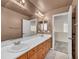 Bathroom featuring a double vanity and tile floors at 6424 Grayback Dr, North Las Vegas, NV 89084