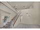 Spacious entryway boasting tile flooring, staircase, and high ceilings at 6424 Grayback Dr, North Las Vegas, NV 89084