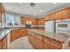 Spacious kitchen featuring granite countertops, an island, and ample cabinetry at 6424 Grayback Dr, North Las Vegas, NV 89084