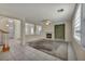 Spacious living room with a fireplace and open view of entryway at 6424 Grayback Dr, North Las Vegas, NV 89084