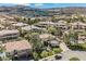 Expansive home featuring mature landscaping, a circular driveway, and a classic tile roof at 764 Ricota Ct, Henderson, NV 89012