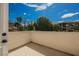 Balcony offering serene views of lush landscaping and blue skies at 764 Ricota Ct, Henderson, NV 89012