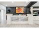 Home bar with art display is great for entertaining guests at 764 Ricota Ct, Henderson, NV 89012