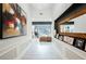 Grand entry hall with art, accent mirror, and view to living room at 764 Ricota Ct, Henderson, NV 89012