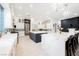Spacious kitchen with double islands, stainless appliances, and white cabinetry at 764 Ricota Ct, Henderson, NV 89012